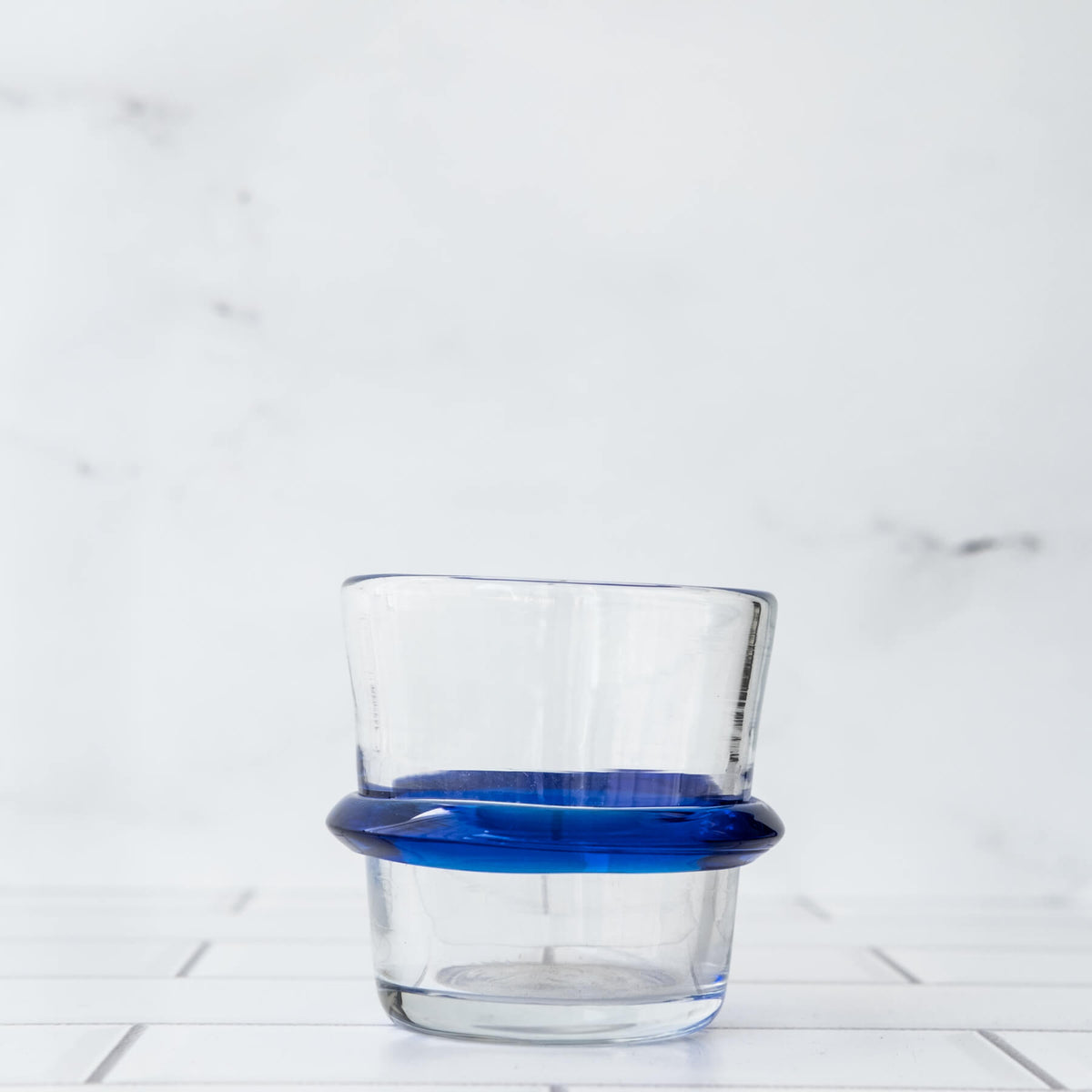 Product photo for Blenko 448R Ring Glass - Crystal with Cobalt