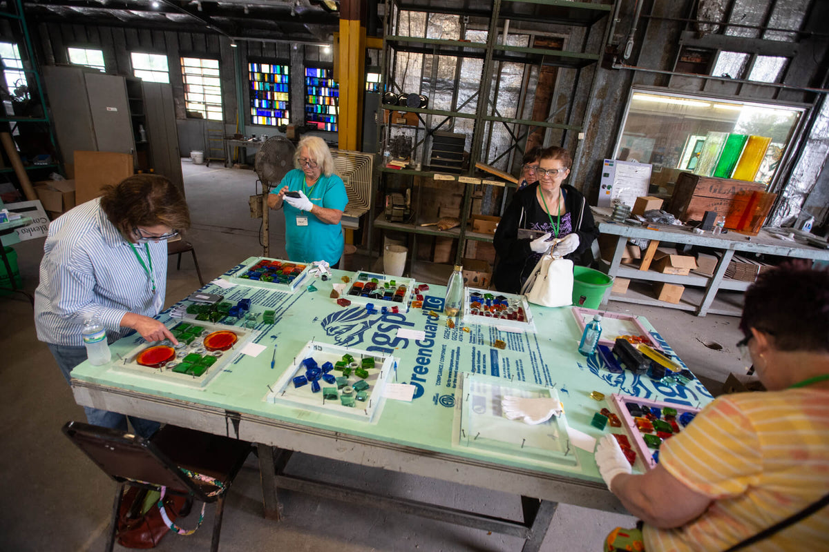 Participants working on their glass projects